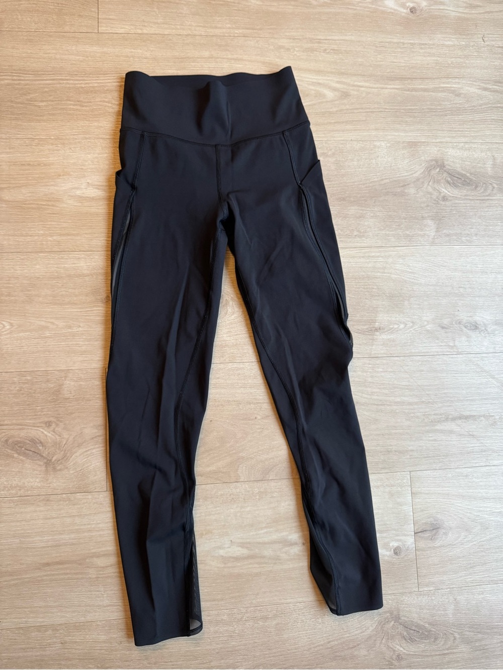 Lululemon Black High-Waist Leggings (with pockets and mesh on the sides)